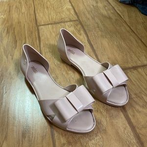 Melissa flats. They are super comfy and cute.